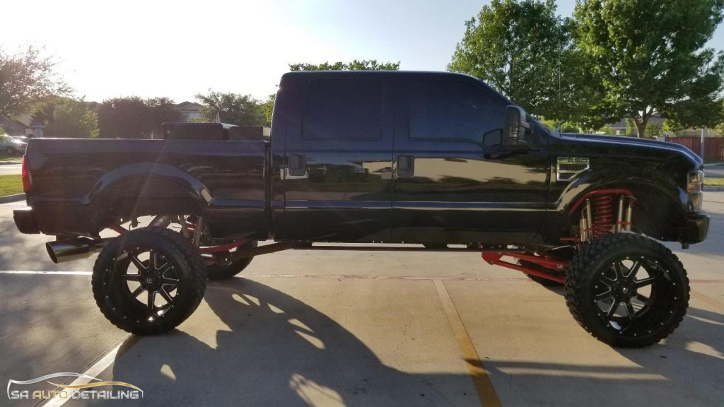 Lifted 2010 F-250 4x4 6.4L Diesel Black with Red Suspension Lift