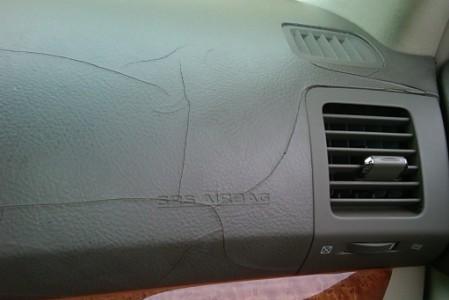 Vehicle with Dashboard Cracked and Faded