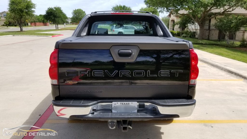 Rear View of Black Truck